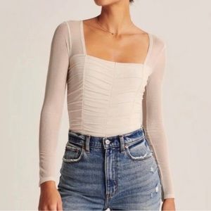 Abercrombie and Fitch white bodysuit with mesh back and sleeves